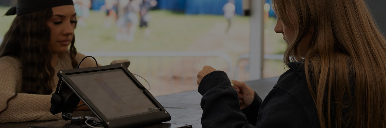 Tablet setup for attendee check-in at outdoor event